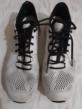 White Athletic Running Shoes with Black Accents